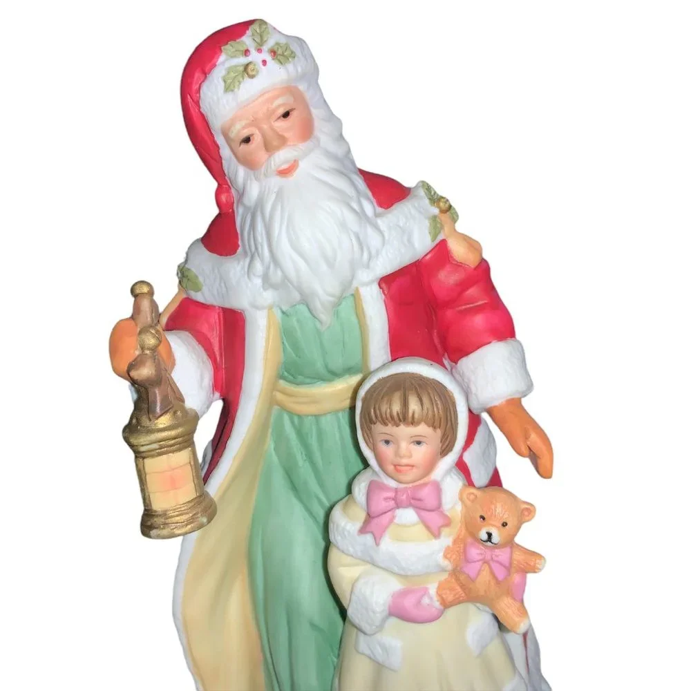 Avon 1995 Ceramic Santa with Child Figurine